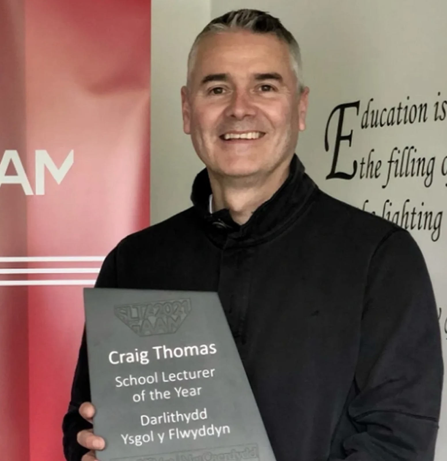 Dr Craig Thomas with his School Lecturer of the Year award
